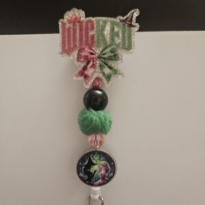 Wicked Themed Badge Reel with Green and Pink Accents